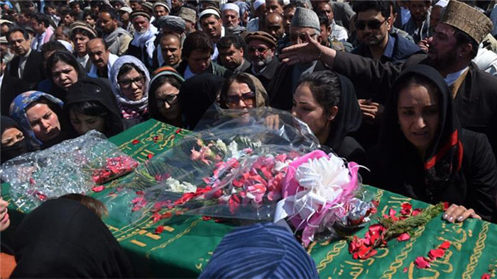 Afghan activist women carry the coffin of Farkhunda