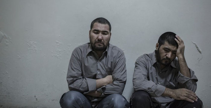 Murad Ali Hamidi (left) and Said Ahmed Hussein were captured by rebel forces after storming a building in Aleppo, led 
by an Iranian officer. Syria